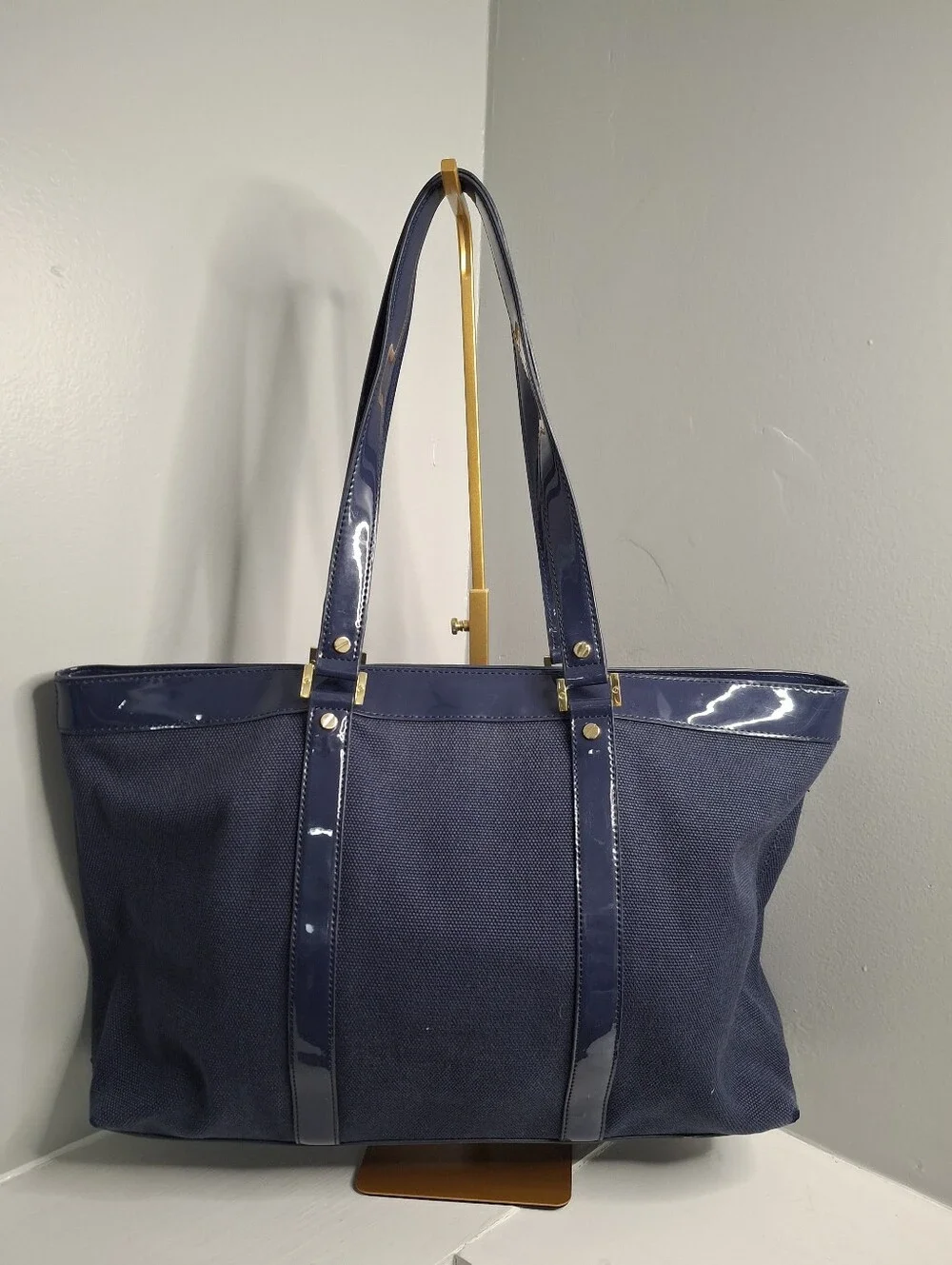 Tory Burch navy medallion otherwise